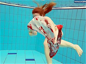 molten polish ginger-haired swimming in the pool